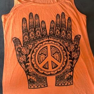 Peach colored tank top with cute design